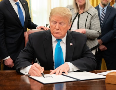 trump signs document