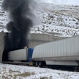trucks outside burning tunnel