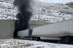 trucks outside burning tunnel