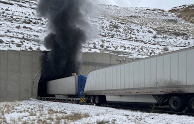 trucks outside burning tunnel