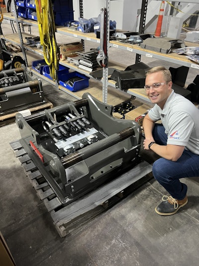 Blake Schaab at OilQuick with Hydraulic Coupler System in production for ADND's excavators.