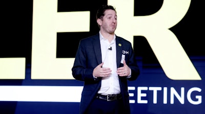 Brian Weisbaum speaks during the first ever New Holland Construction dealer meeting.