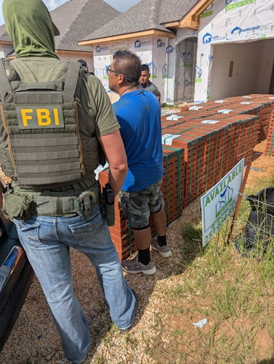 online fraud June 20 immigration raid at housing construction site in Baldwin County, Alabama.