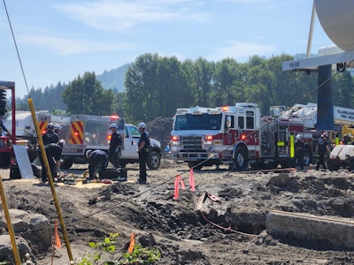 A worker was in a 15-foot-deep trench June 3 in Woodland, Washington, when an excavator bucket landed on him, causing traumatic injury, according to fire department and media reports.