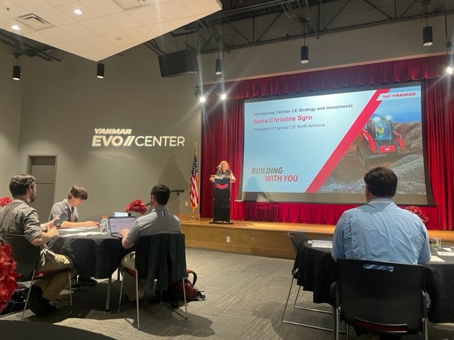 Anna Christine Sgro, president of Yanmar Compact Equipment North America, addresses the media during a private event at the company's Evo Center in Acworth, Georgia.