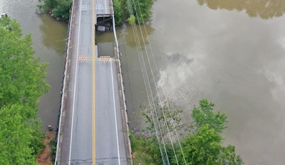 The Crowe Creek Road Bridge, seen here, partially collapsed shortly after a truck surpassing its weight limit drove over it.