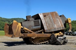 WhistlinDiesel's replica of the infamous 'Killdozer' crushes a car in their YouTube video.