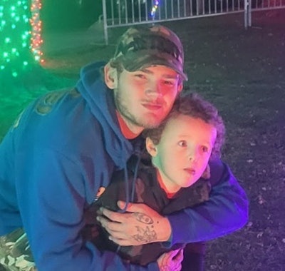 Ryan Starnes with son