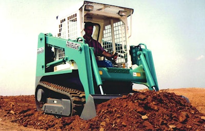 Takeuchi is credited with the first compact track loader in 1986 after its founder saw a wheeled skid steer stuck in mud. However, ASV is credited with the first CTL to hit the market, with its MD-70 Posi-Track, in 1990. Takeuchi launched its first commercial CTL in 1991 as the TL26, shown above.