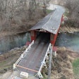 The Red Covered Bridge seen shut down after a vehicle strike.