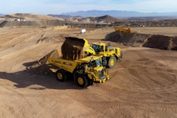 An autonomous Komatsu HD605-10 running on Komatsu Smart Quarry Autonomous, powered by Pronto, is being loaded at Komatsu’s Arizona Proving Grounds.