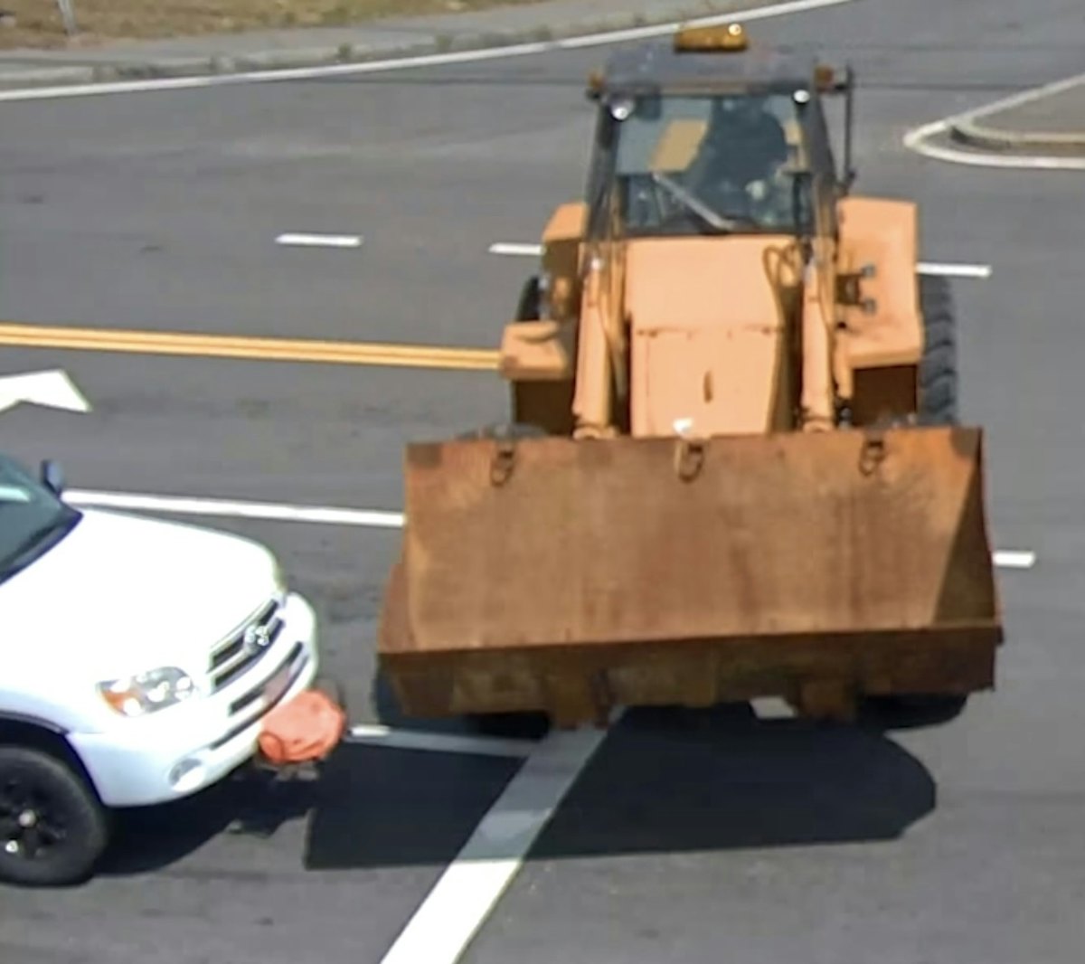 Video: Runaway Wheel Loader Hits SUV, Signs at Busy Intersection