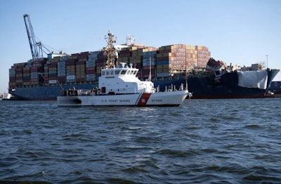 The U.S. Coast Guard escorts the Dali from Baltimore to Norfolk, Virginia, June 24, 2024, after the cargo ship crashed into the Key Bridge, causing its deadly collapse three months earlier.
