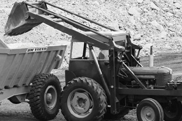 In 1954, Bolinder-Munktell, owned by Volvo, introduced the H-10, an ordinary tractor turned around with the loader bucket over the bigger wheels. Volvo marks it as its first wheel loader, a product that's come a long way and continues to evolve.