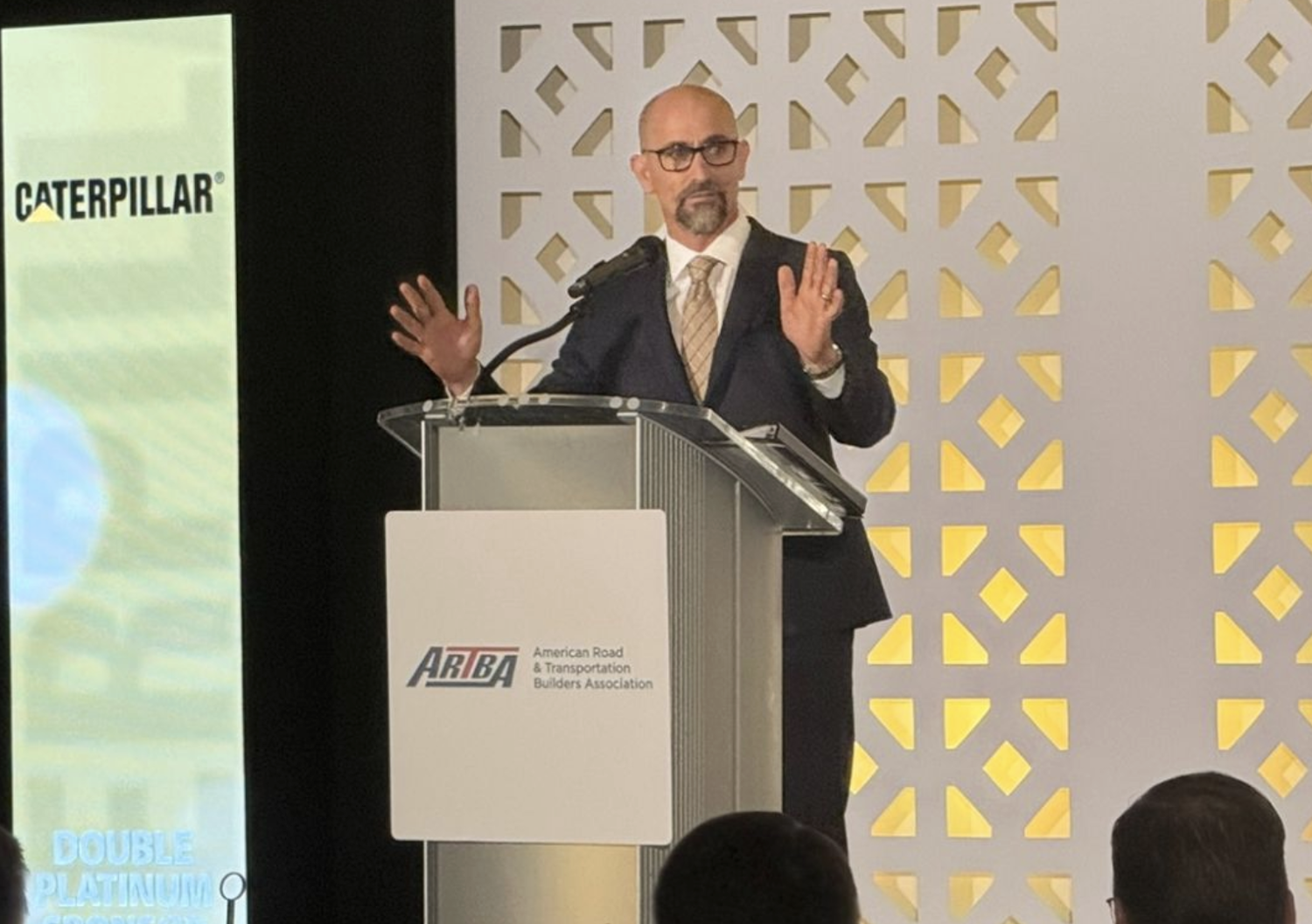 Anthony Fassino, group president of Caterpillar Construction Industries, speaking at an American Road & Transportation Builders Association event.