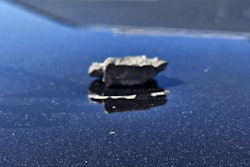 A piece of shrapnel after striking the hood of a California Highway Patrol vehicle