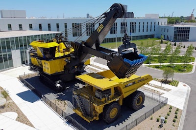 Visitors to Komatsu Mining Technologies' global headquarters in Milwaukee are greeted by a P&H 4100A electric rope shovel weighing 2.5 million pounds and a 2,500-horsepower, 850,000-pound Komatsu 830E electric-drive haul truck.