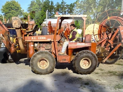 Ephrain Rangel on a Ditch Witch trencher