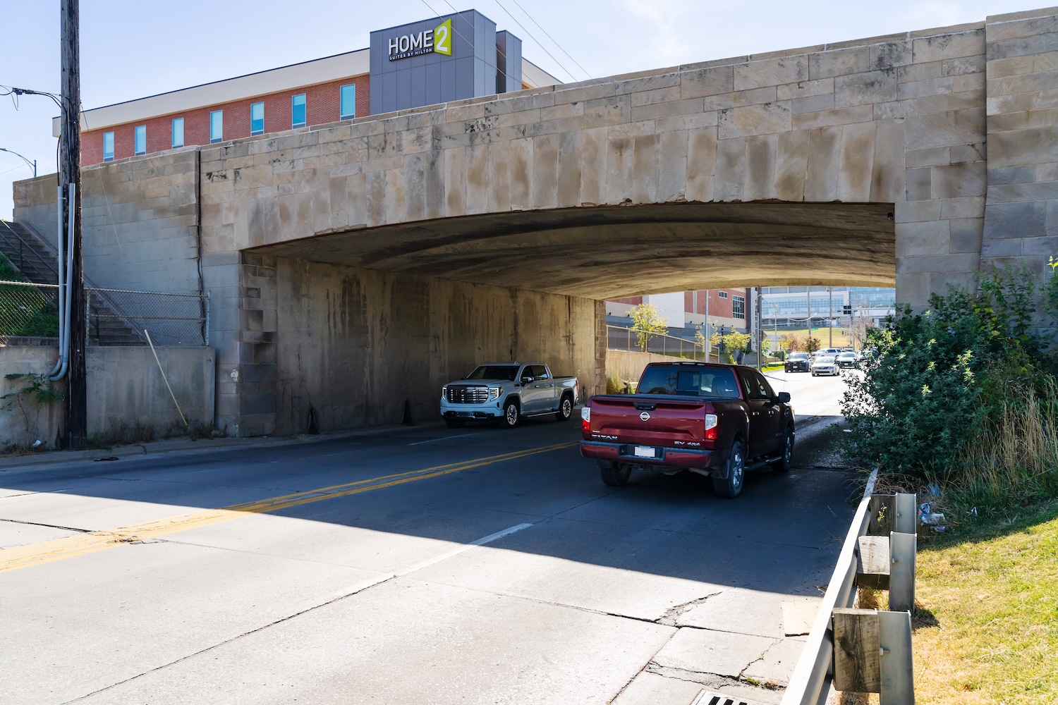 The 90-year-old Saddle Creek Bridge, seen here, was assembled with historic Dodge Street curbstones.