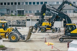 From the left, Volvo L120 Electric wheel loader, EW240 Electric material handler and EC230 Electric crawler excavator take part in the world's first all-electric demolition site.