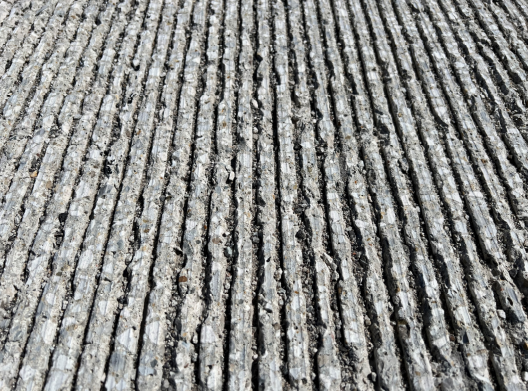 Some tines on recent concrete pours in Indiana are exhibiting early deterioration, seen here.