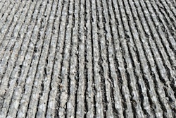 Some tines on recent concrete pours in Indiana are exhibiting early deterioration, seen here.