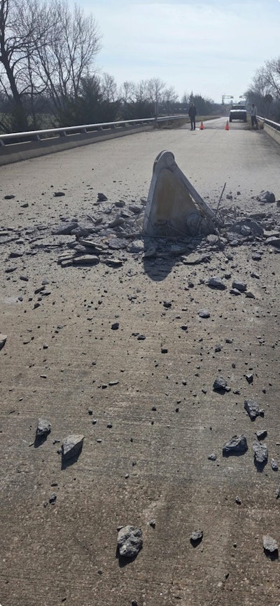 An excavator being hauled in Kansas crashed into a bridge and pushed through its deck, closing the span until mid- to late 2026 for up to $1 million worth of repairs.