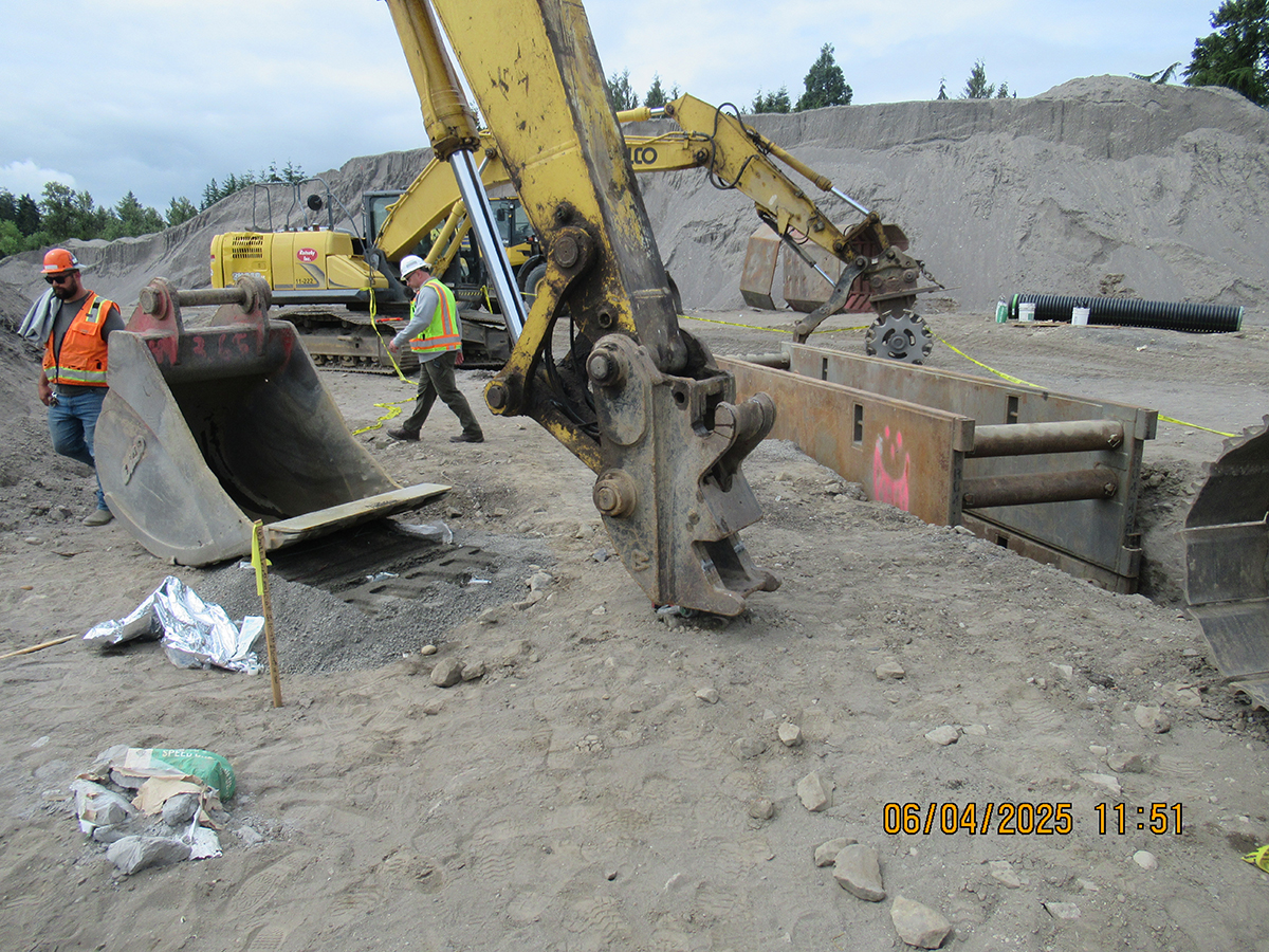This excavator bucket came unlatched from the excavator's quick coupler June 3 in Washington due to a missing safety latch, according to L&I.