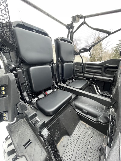 The rear seats in the Honda Pioneer 700-4 can be raised in a matter of seconds to carry additional passengers or lowered to use the full cargo bed.
