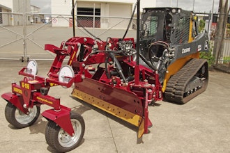 The front wheel assembly on the SharpGrade G116 can be raised and lowered hydraulically from the cab.