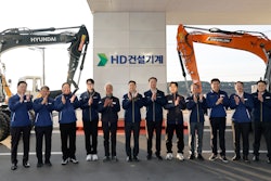 HD Hyundai Chairman Kisun Chung (sixth from left) takes a commemorative photo with HD Construction Equipment CEO Jae-young Moon (seventh from left) and other key executives at the HD Construction Equipment plaque-unveiling ceremony held at the Ulsan, South Korea campus.