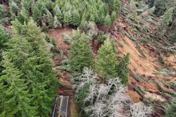 An aerial view of the OR 229 landslide, which has completely covered the road.