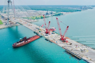 An aerial view of the Gordie Howe Bridge as the bridge deck is completed, circa 2024.