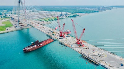An aerial view of the Gordie Howe Bridge as the bridge deck is completed, circa 2024.