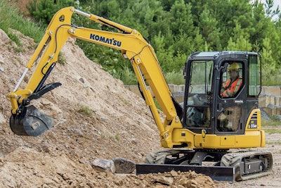 Komatsu's top-selling mini excavator is the 5-metric-ton PC55MR-5. It runs on a 38-horsepower Komatsu diesel, has a dig depth of 12 feet 4 inches, and dig reach of 20 feet 5 inches.