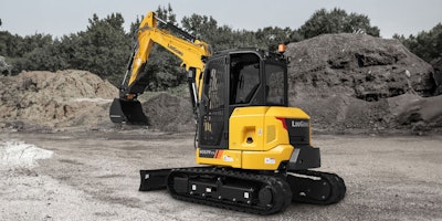 The 5.7-metric-ton 9057 FTZS also runs on a 48-horsepower Yanmar. Dig depth is nearly 12 feet, and reach is 20 feet 3 inches.
