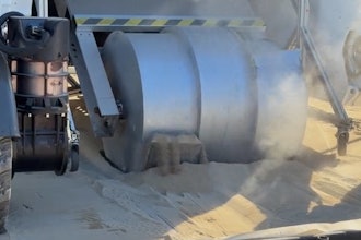 A prototype lunar drum excavator attached to a rover performs a simulated excavation. Its creators say the test marks the first step toward future lunar construction projects.