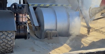 A prototype lunar drum excavator attached to a rover performs a simulated excavation. Its creators say the test marks the first step toward future lunar construction projects.