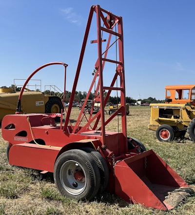 The arch-shaped rod over the seat on the Scoopmobile was used like a boat tiller for steering the late-1940s wheel loader.