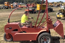 A volunteer operates the late-1940s Scoopmobile at the Historical Construction Equipment Association's 2025 annual convention. Check out our video to watch it in action.