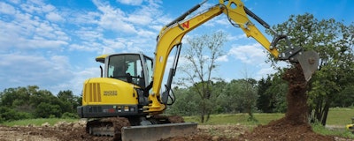 At 6 to 7 metric tons, depending on configuration, the ET65 runs on a 56.3-horsepower Perkins diesel engine and has a dig depth of 13 feet 8.7 inches.