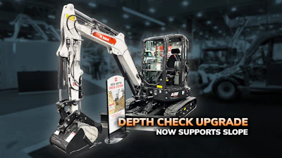 Takeuchi mini excavator with depth check upgrade feature supporting slope capability in industrial setting