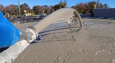 Balfour Betty crews deploy lightweight cellular concrete on the U.S. 70 improvement project. The quick-settling concrete is replacing traditional fill in subpar soil where the highway will be elevated for interstate-grade exits for a future I-42 between Raleigh and Morehead City.