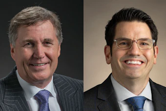 Caterpillar's former CFO, Andrew Bonfield, (left) and the new CFO, Kyle Epley.