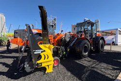 Hitachi ZW140-7 wheel loader equipped with a Steelwrist SQL50 automatic quick coupler and a snowblower attachment.