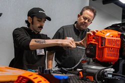 Instructor facilitates ECHO engine training.