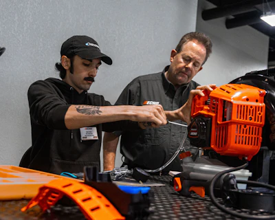 Instructor facilitates ECHO engine training.