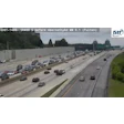 Highway traffic camera view of SR400 South before Abernathy Road in Fulton, showing congested traffic with multiple vehicles and construction barriers