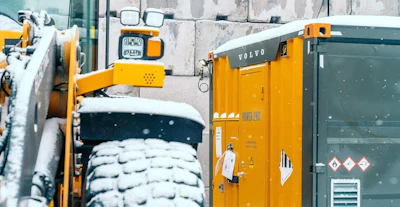 The L120 Electric by Volvo's PU500 mobile charger on a test site in Sweden's extreme cold.