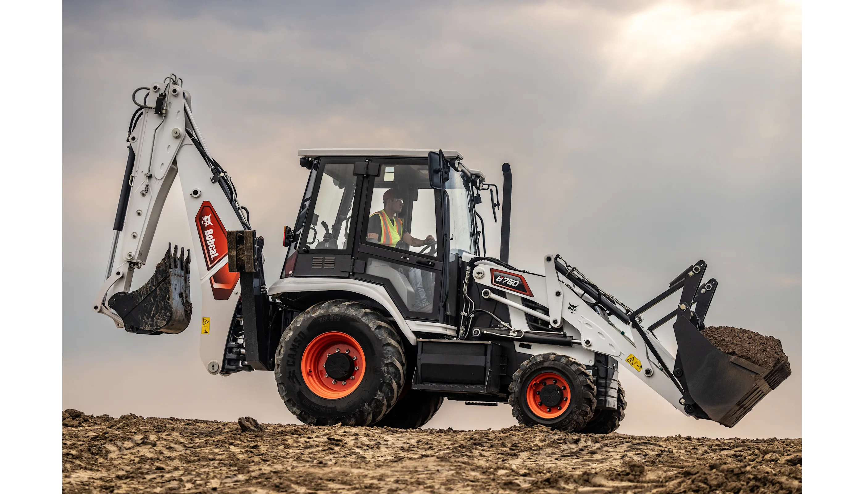 Bobcat backhoe on a hill